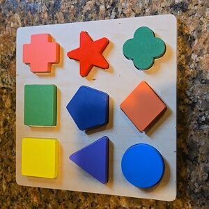Wooden shapes puzzle.